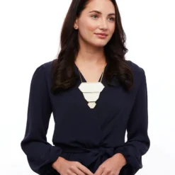 Brackish Statement Necklace: Abyad -Clothing Store abyad feather petite statement necklace lifestyle 2 720x 02329.1651867162